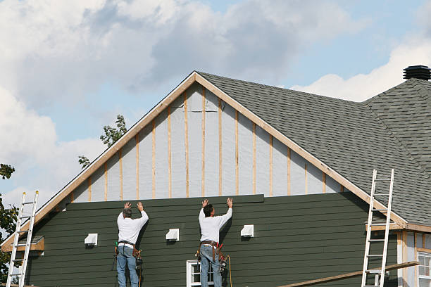 Professional Storm Damage Siding Repair technician working in Hickory, NC